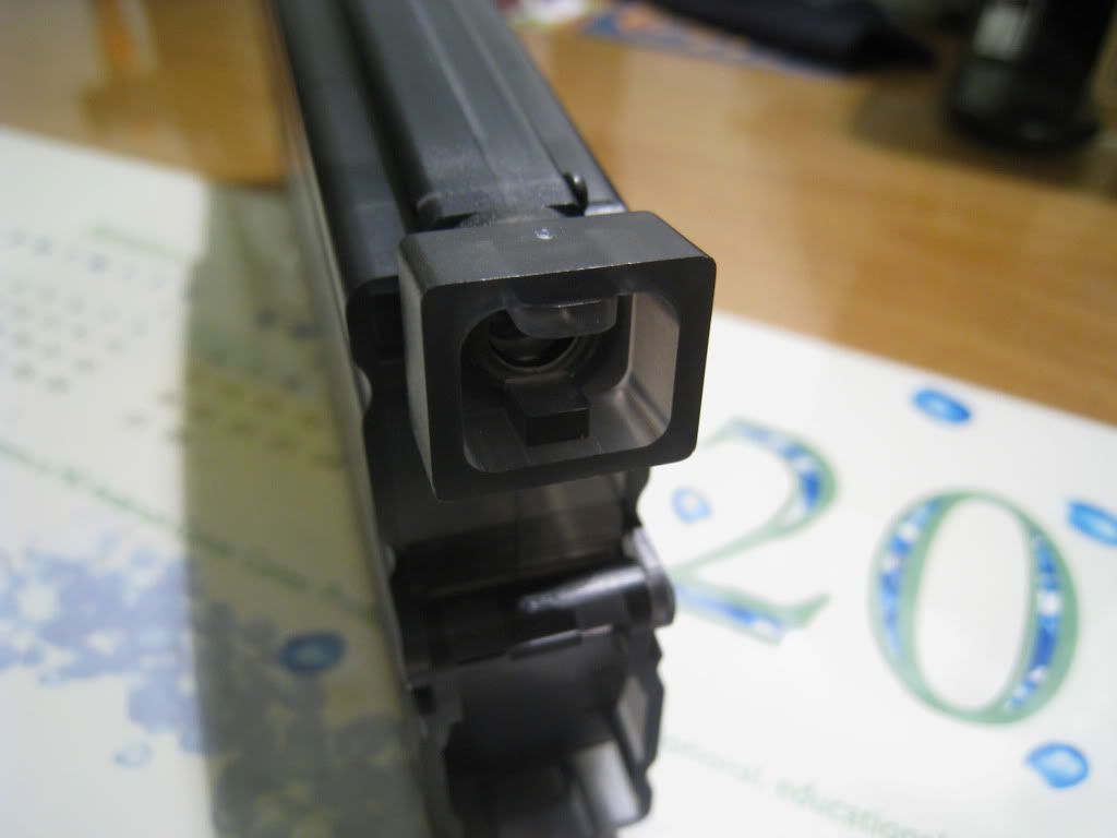 http://i8.photobucket.com/albums/a1/aznriptide859/Airsoft/KWA Magazine Speed Loader/IMG_1380.jpg
